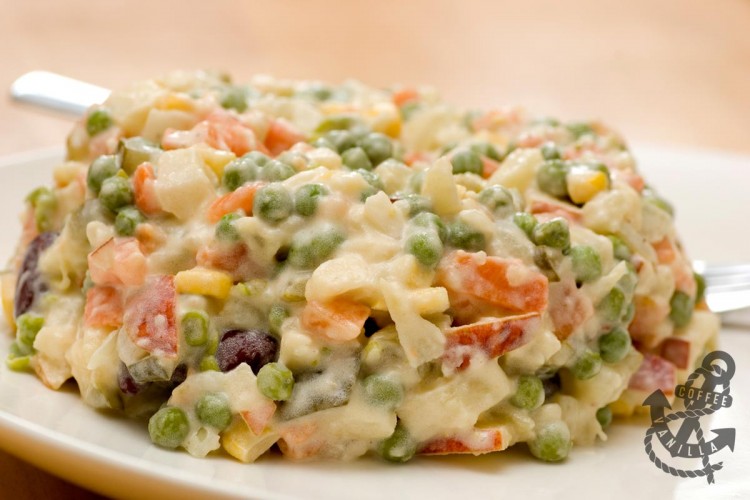 vegetable salad with root veggies peas corn and mayonnaise 