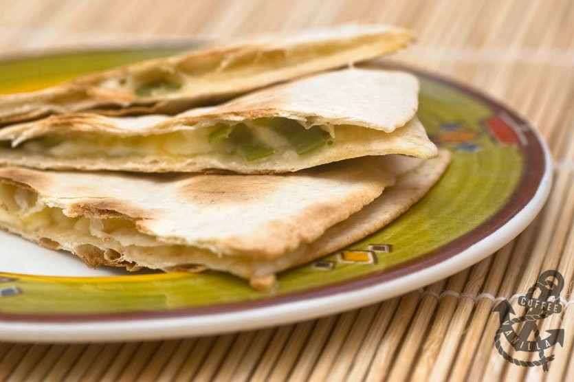 tortilla wraps filled with cheese and spring onions