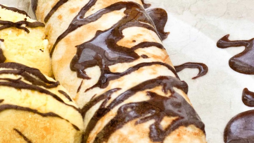 Banana Pancakes with Chocolate Sauce and Vanilla Ice Cream