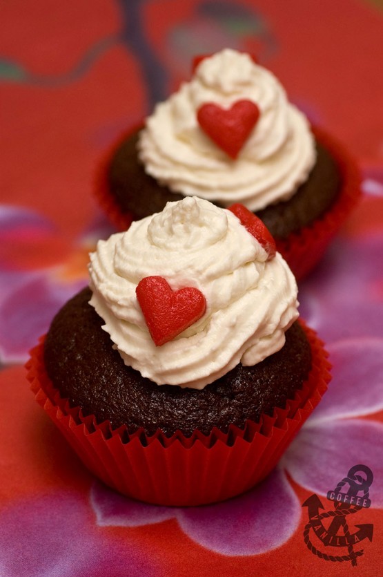 chocolate cupcakes with red heart decorations