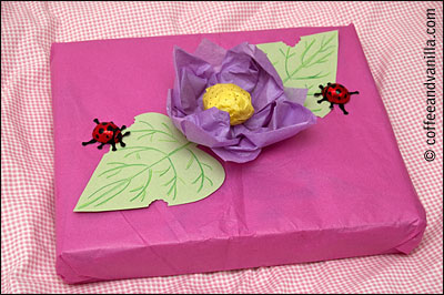 little girl gift wrap tissue flower and lady birds