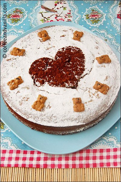 lemon vanilla cake with chocolate heart and sugar teddies