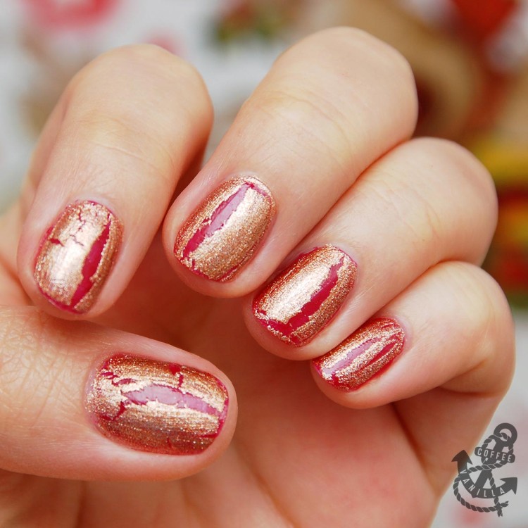 golden crackle nail polish on the top of glossy red base coat