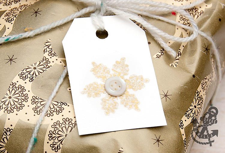 using yarn and button gift tags