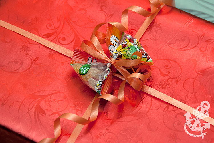 bow made out of candy packet gift wrapping with sweets