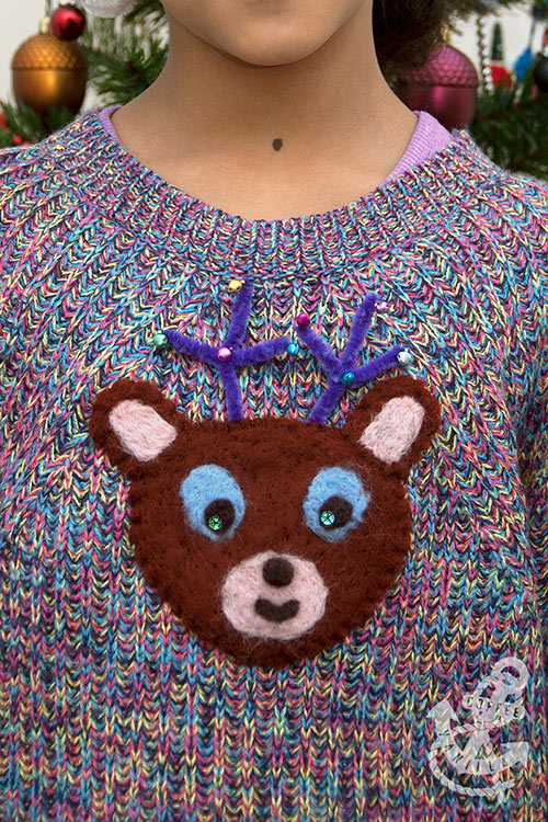 handmade woolly jumper with cute reindeer