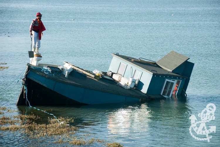 sinking houseboat on Adur River Shoreham by Sea