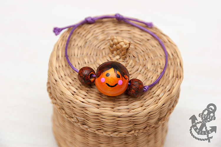 wooden bead bracelet with sliding knot doll face bracelet pendant necklace